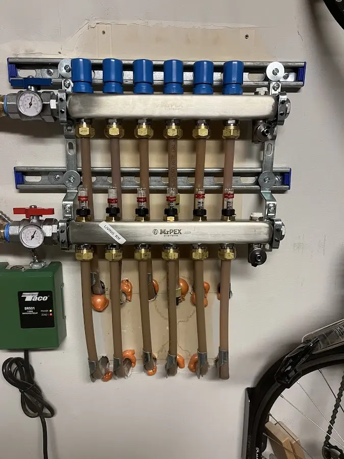 Plumber performing Water Heater Repair at a residential property in Helena